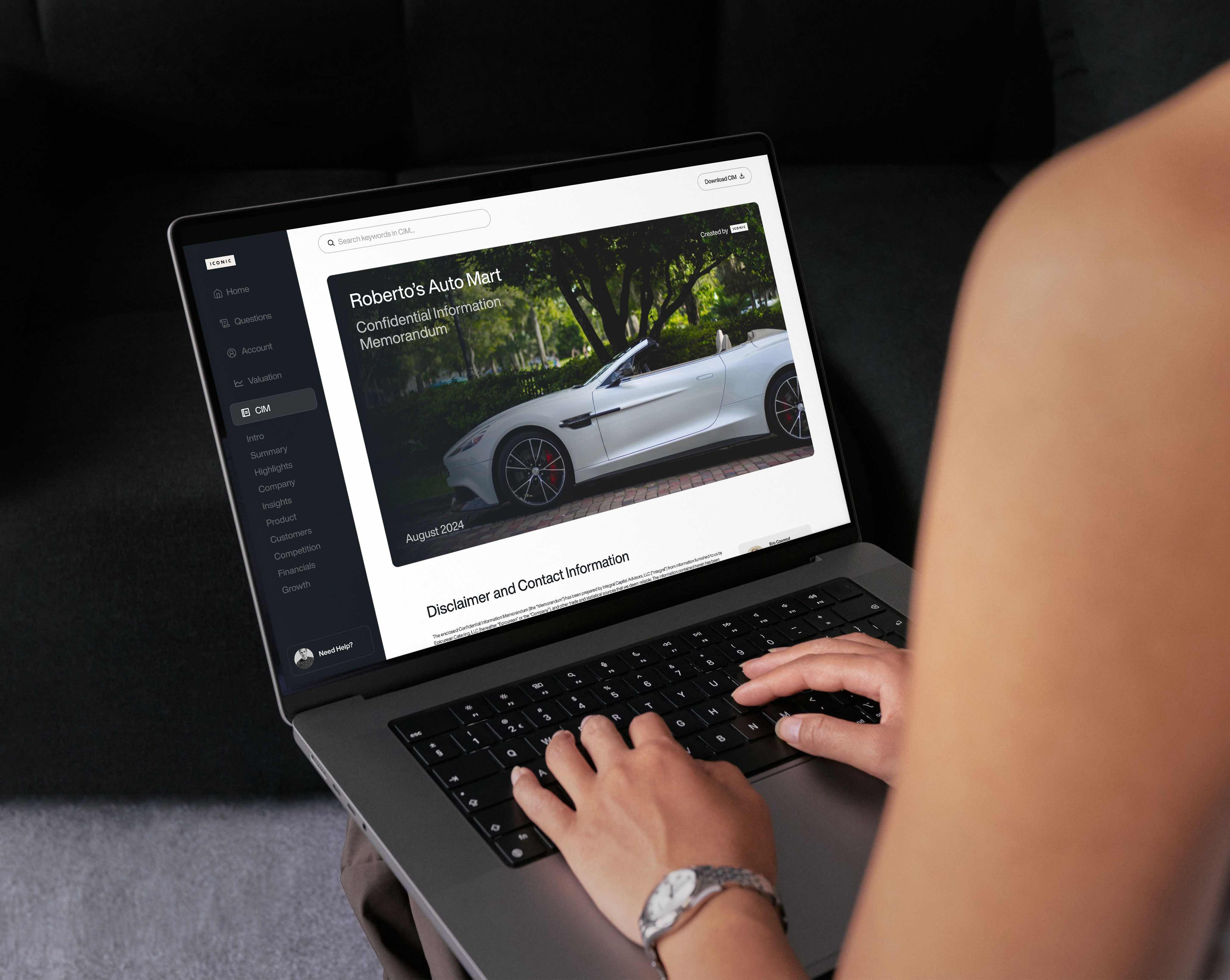 Laptop displaying CIM marketing document